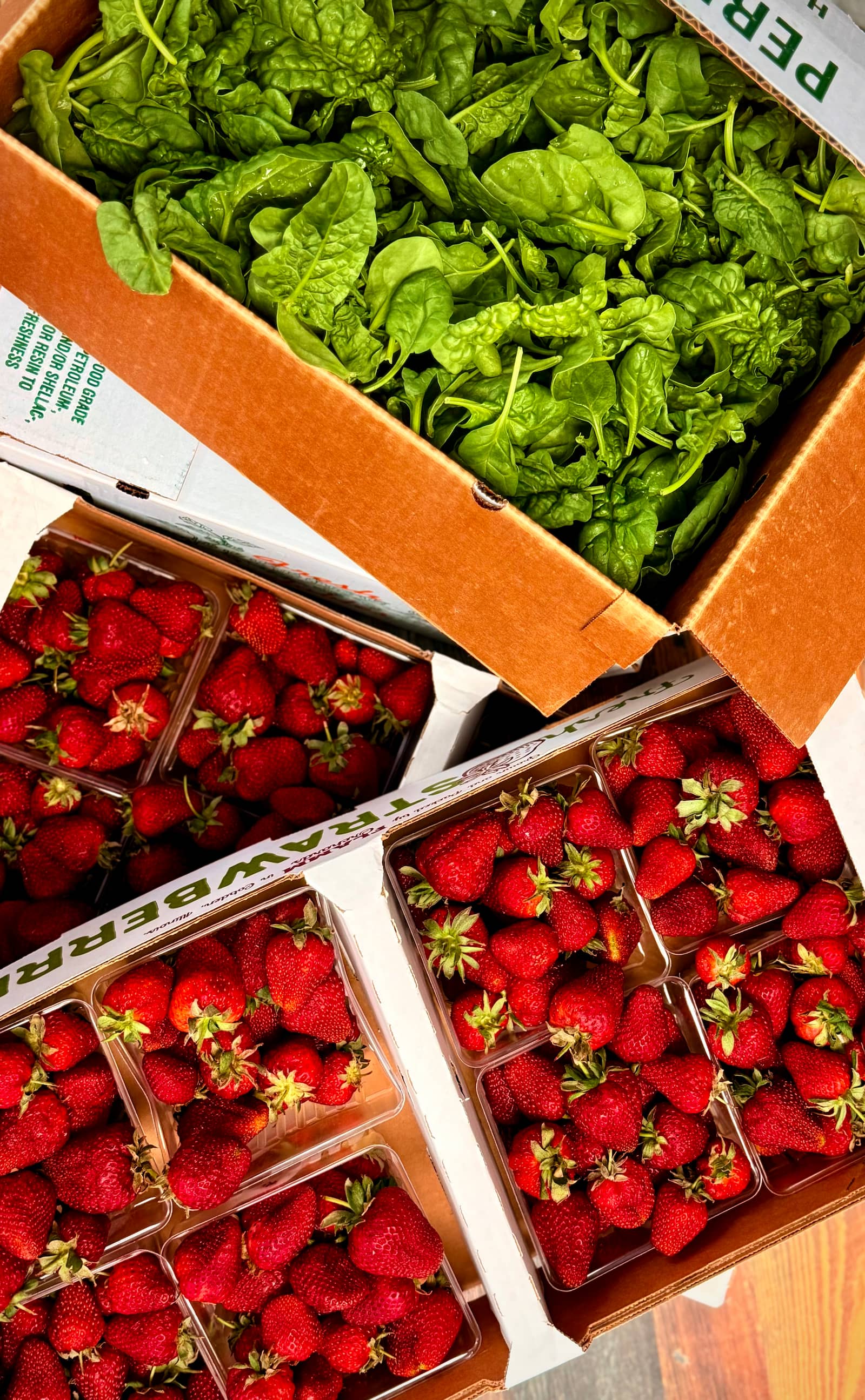 Farm-fresh strawberries and organic greens from local suppliers