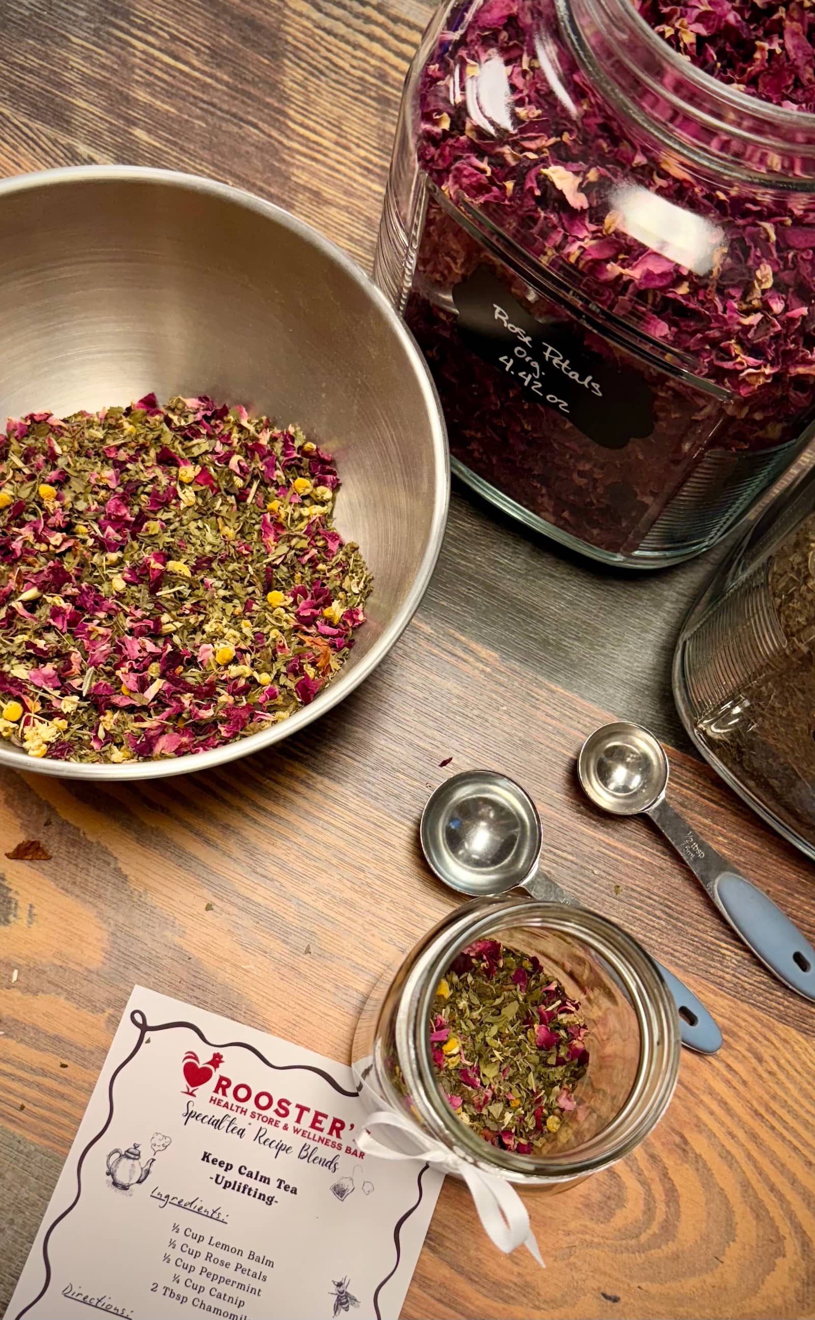 In-house herbal tea preparation with recipe card at Roosters Health Store
