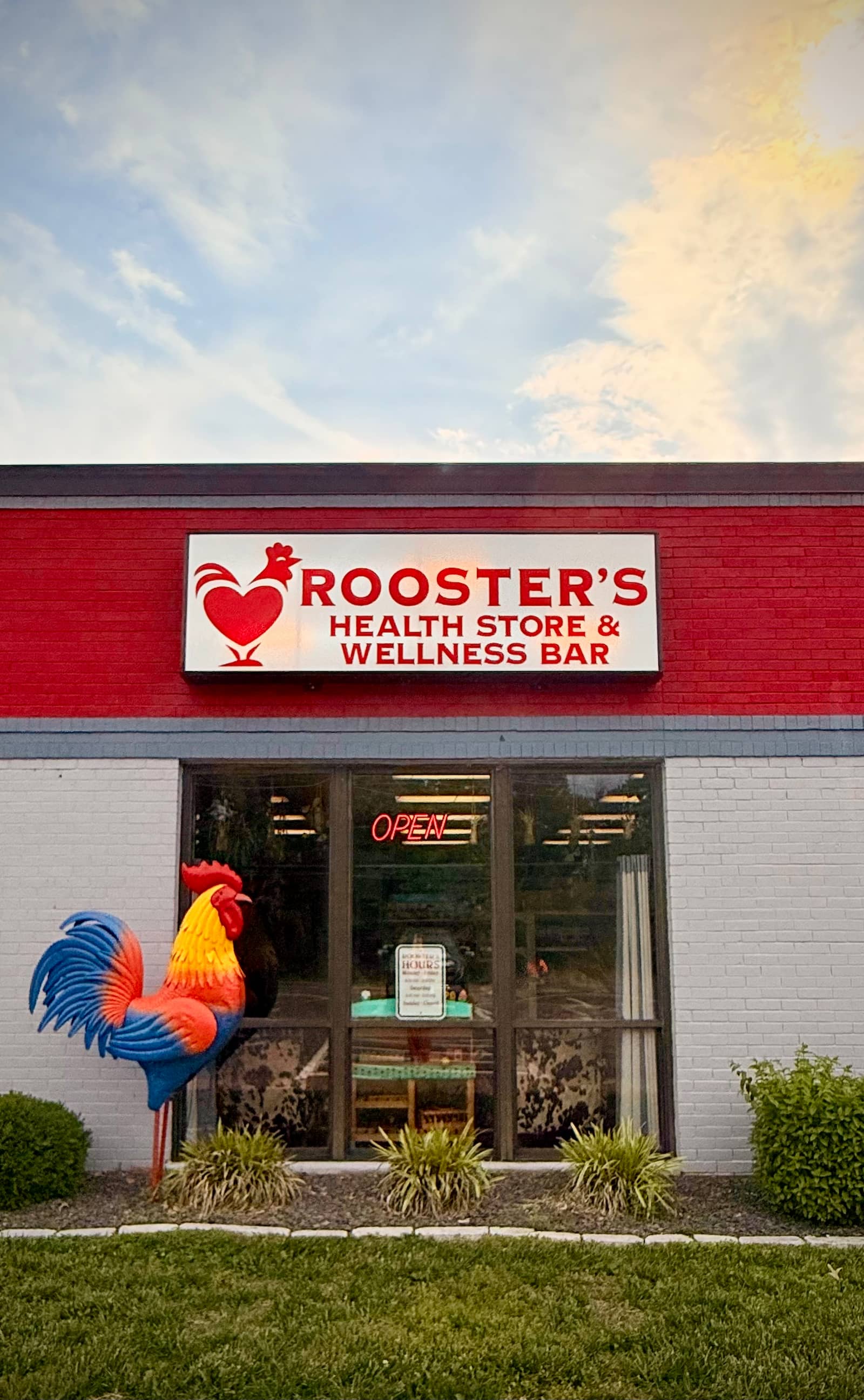 Rooster's Health Store & Wellness Bar exterior sign on a building facade in Columbia, Illinois